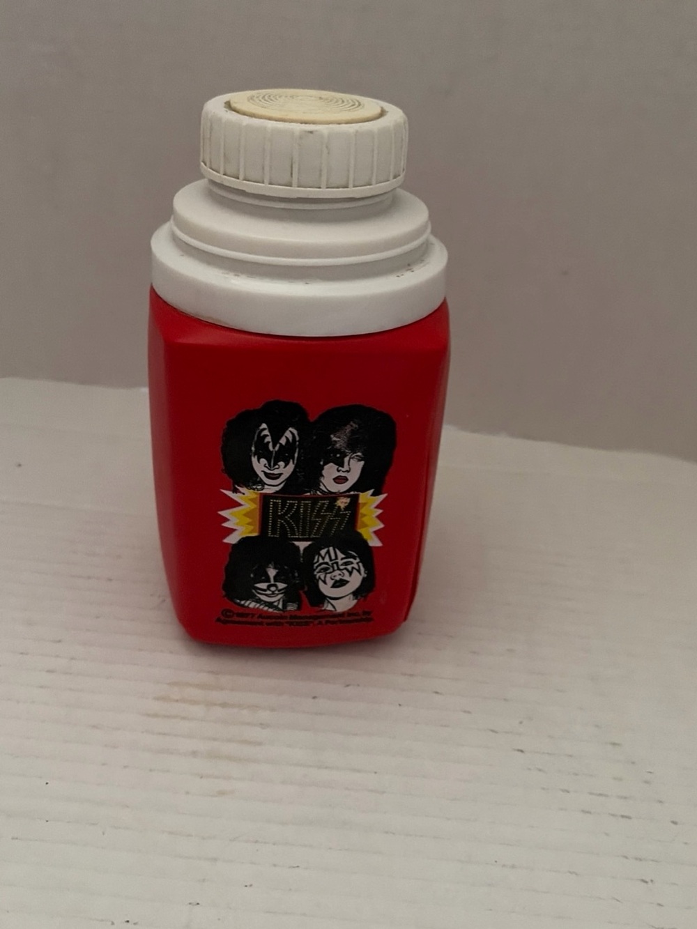 Kiss Kids Bath Powder Bottle in Red with White Cap